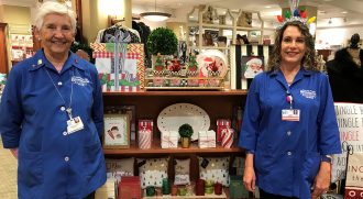 Volunteers at one of AAMC's gift shops